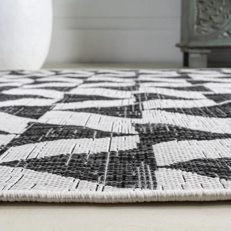 10' Ivory And Black Geometric Indoor Outdoor Runner Rug Homeroots Outdoor