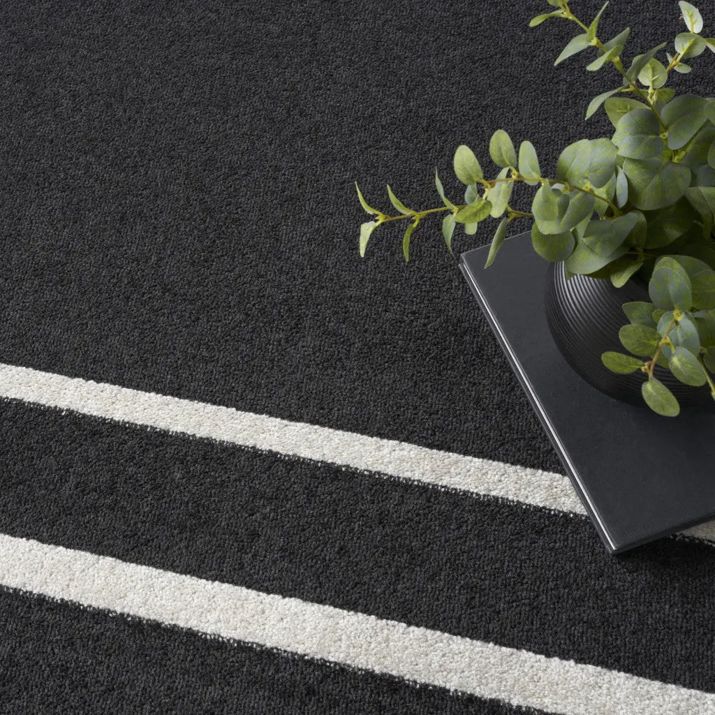 10' X 14' Black And Ivory Indoor Outdoor Area Rug Homeroots Outdoor