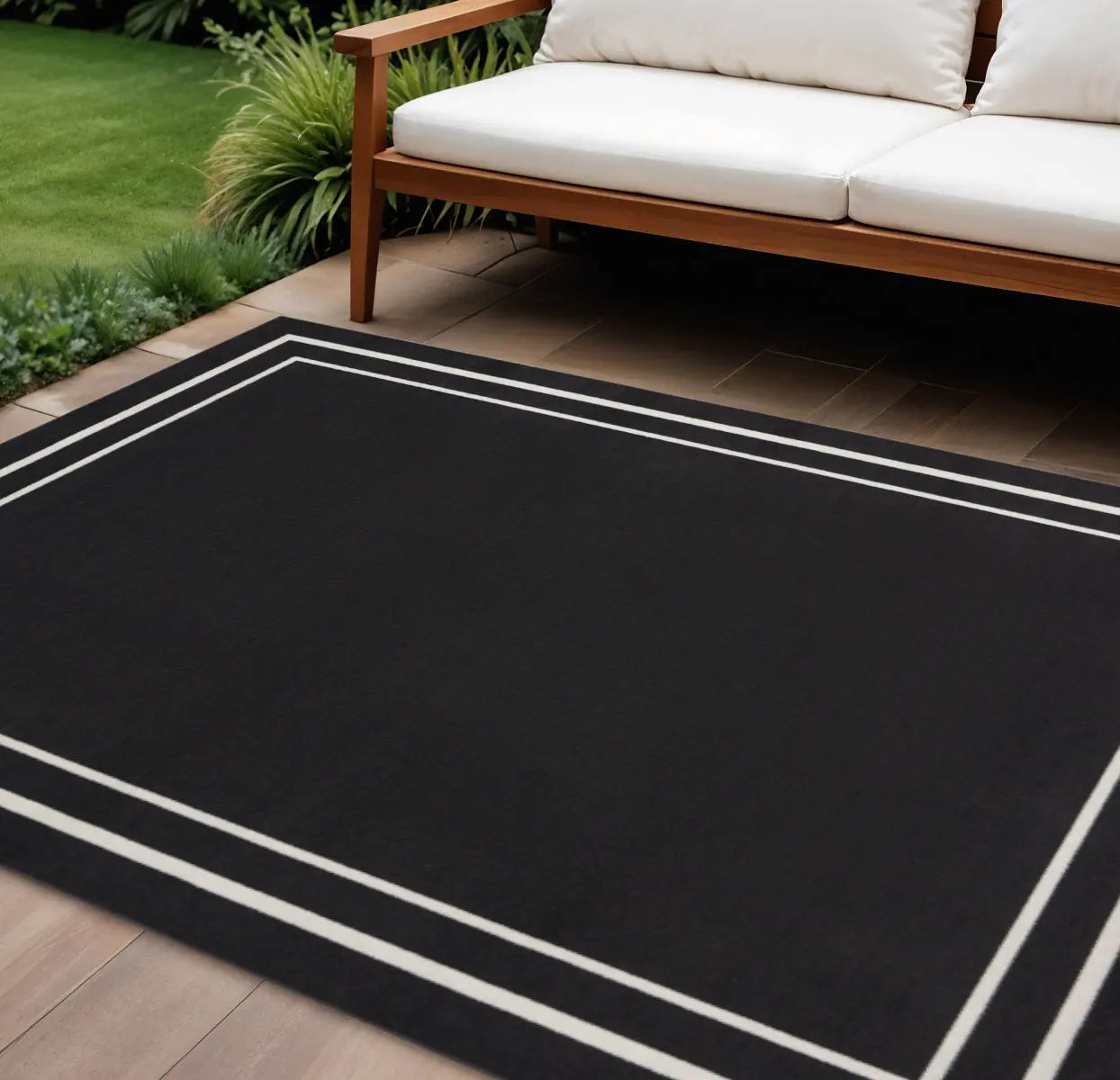 10' X 14' Black And Ivory Indoor Outdoor Area Rug Homeroots Outdoor