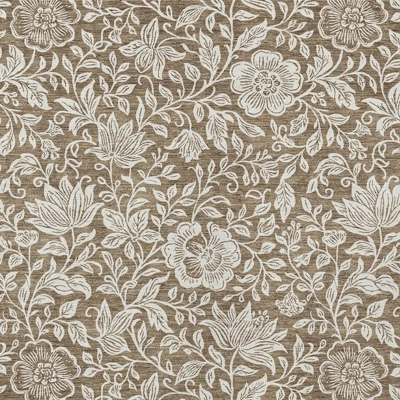 Beige floral fabric with white embroidered flowers, perfect for upholstery and home decor.