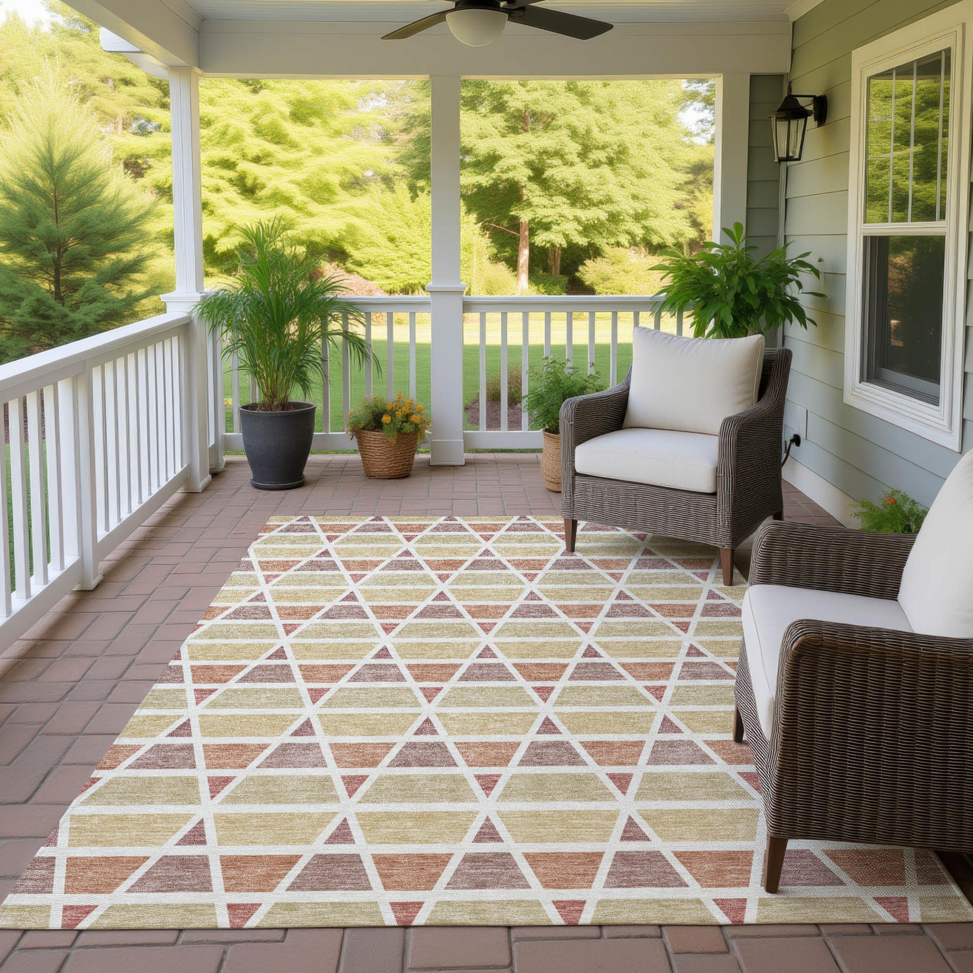 Geometric outdoor rug in beige, orange, and brown with triangles, perfect for patio decor. Durable, weather-resistant material.