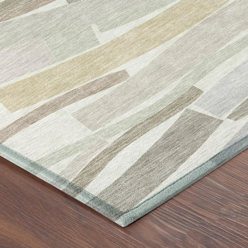 Multicolor abstract area rug in soft greens, browns, and cream, crafted from durable, plush material for modern decor.