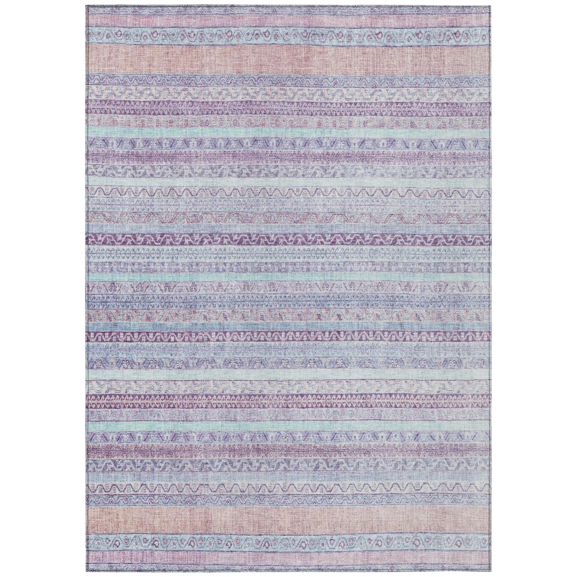 Multicolored bohemian area rug featuring purple, pink, and blue geometric patterns on a light background.