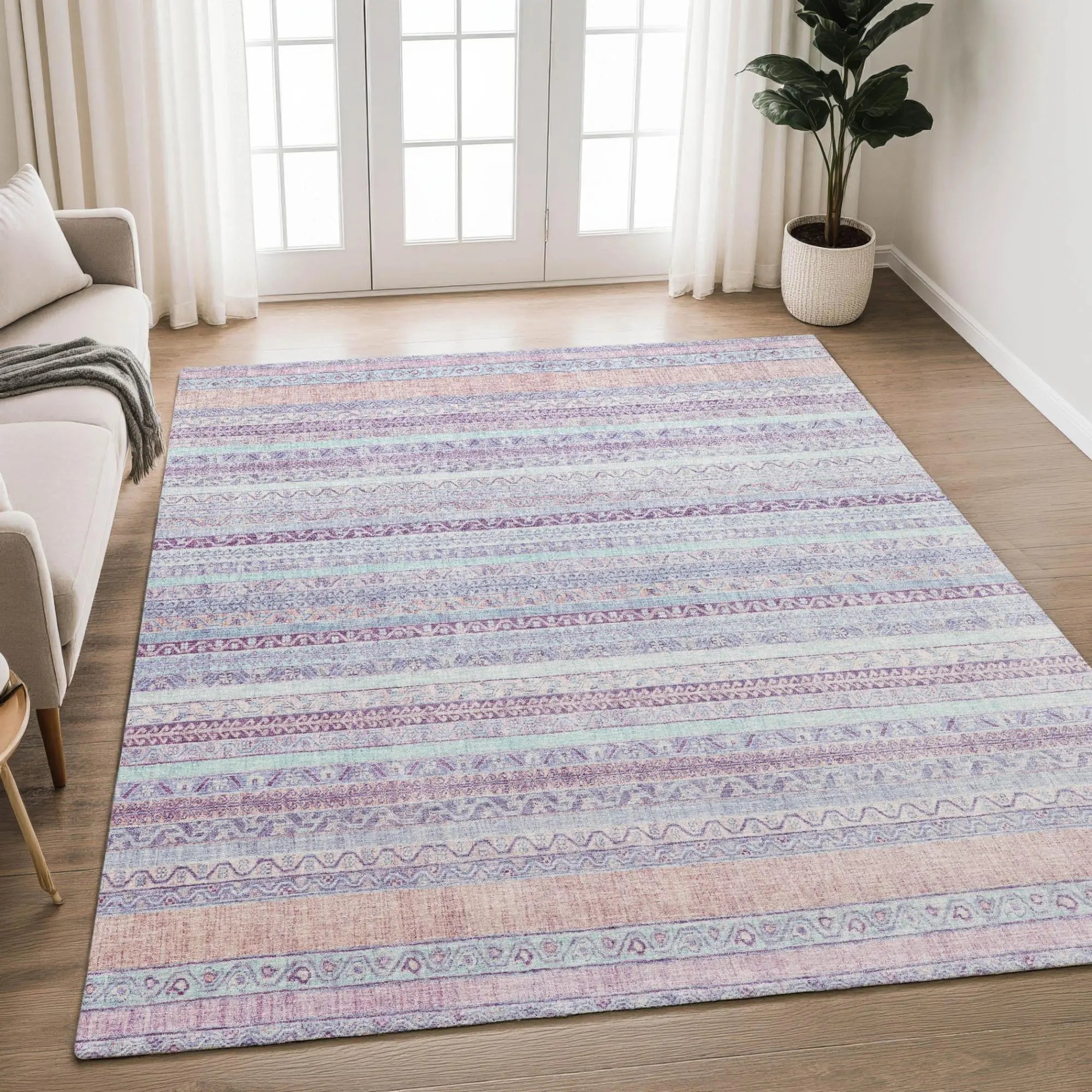 Multicolored Persian-style area rug with purple, blue, and pink stripes, soft fabric ideal for modern living spaces.
