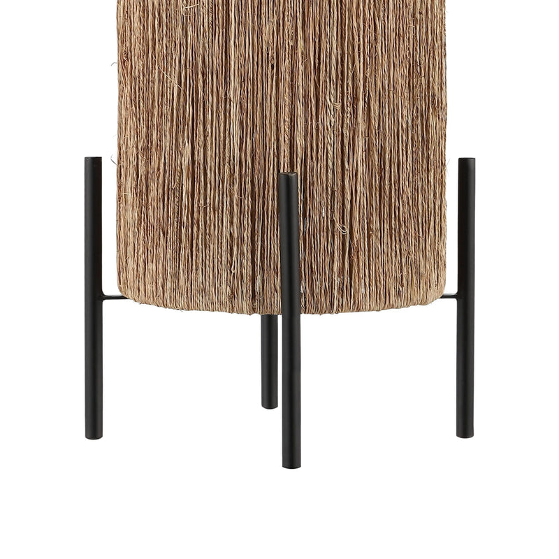 Natural straw decorative planter with black metal legs, modern boho style, ideal for indoor or outdoor use.