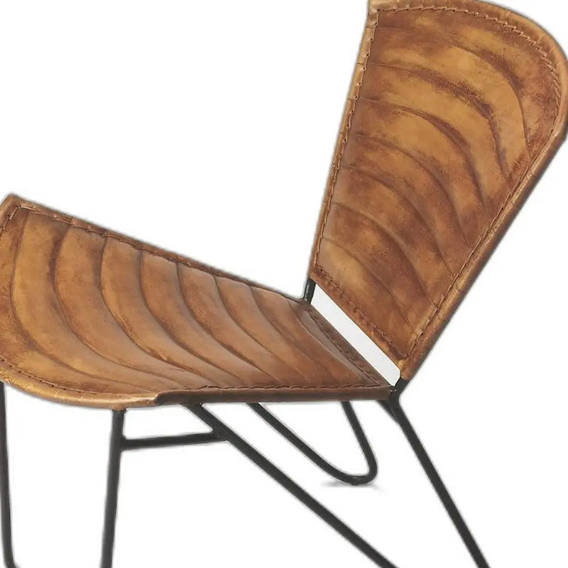 Stylish brown leather chair with quilted design and black metal frame, perfect for modern dining or office decor.