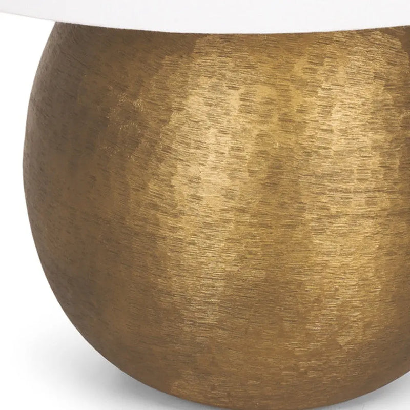 Gold-textured ceramic lamp base with a smooth white shade, perfect for modern home decor.