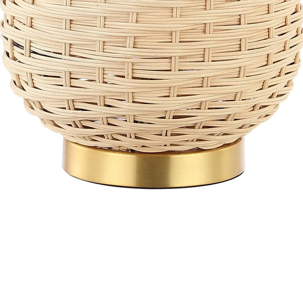 Natural woven rattan basket with a sleek gold metal base, perfect for stylish home decor and organization.