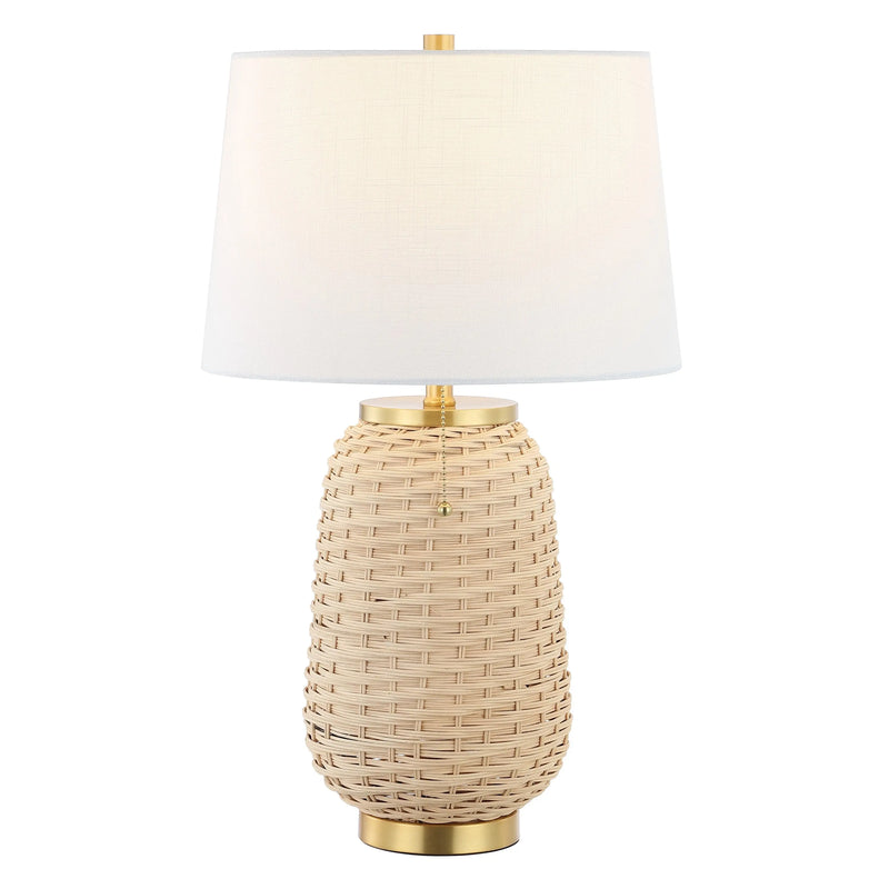 Natural woven rattan table lamp with gold accents and a white fabric shade, perfect for a modern or coastal decor.