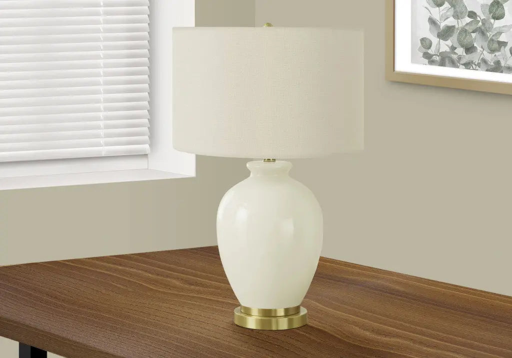 26" Gold and Ivory Ceramic Urn Table Lamp With Cream Drum Shade Homeroots Lighting