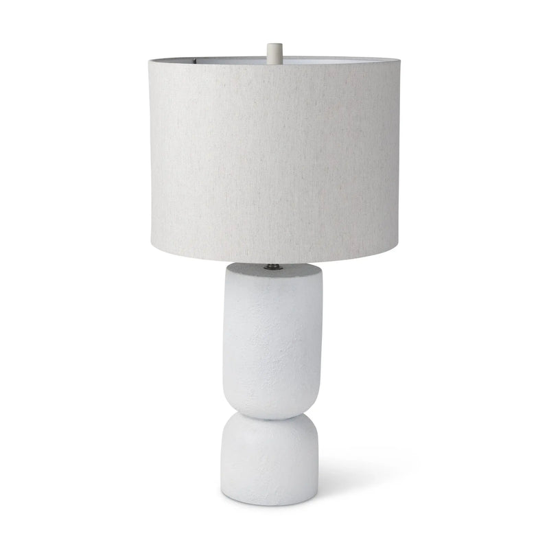White ceramic table lamp with a textured base and a light grey fabric shade, perfect for modern decor.