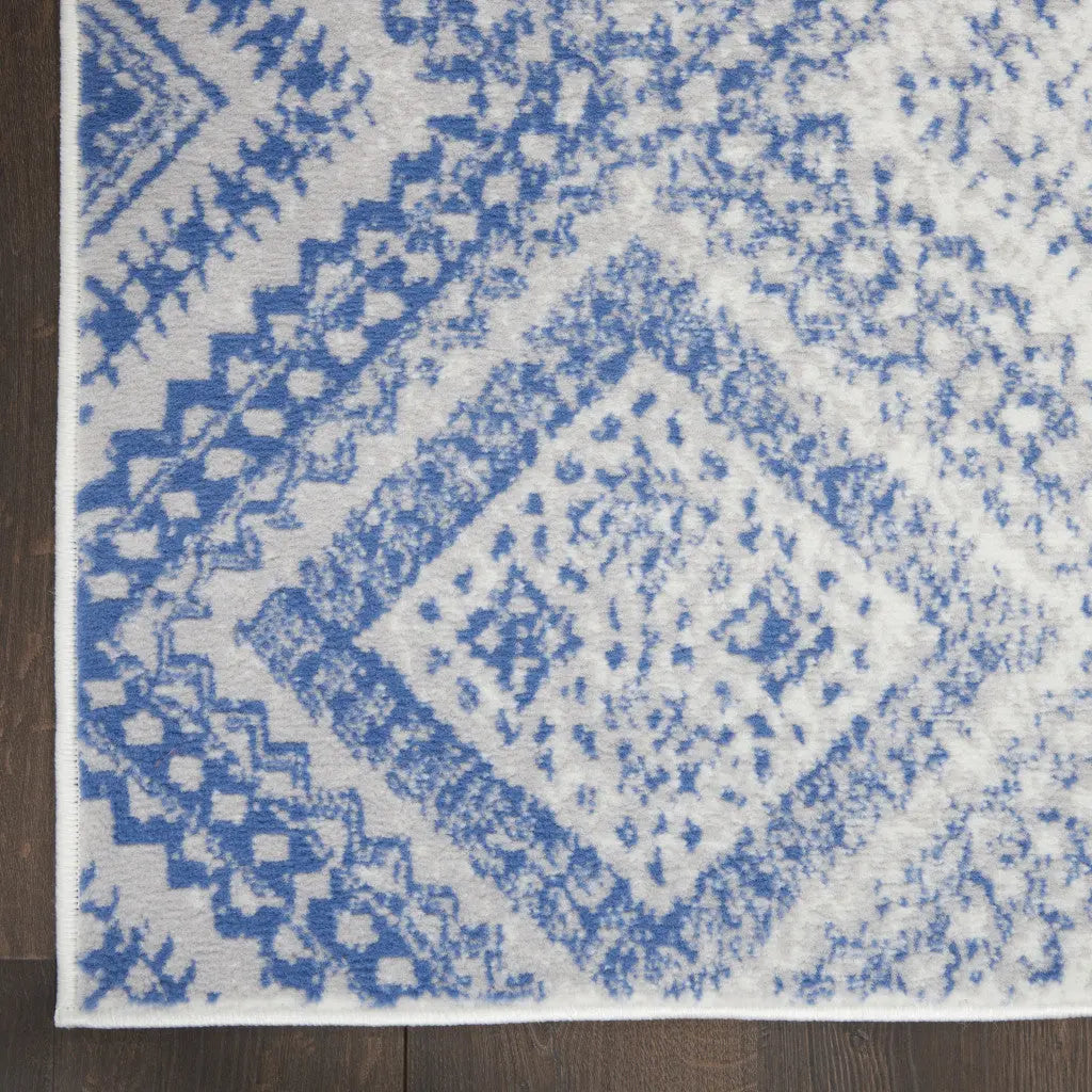 2' X 3' Ivory and Blue Geometric Distressed Area Rug GreatEagleInc