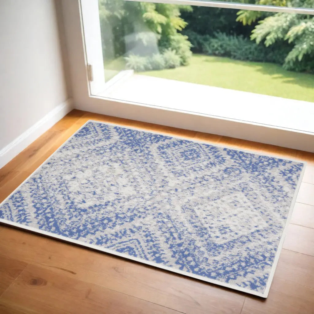 2' X 3' Ivory and Blue Geometric Distressed Area Rug GreatEagleInc