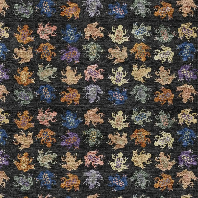 Multicolored frog pattern on black fabric, featuring intricate details and a whimsical, playful style. Perfect for apparel or crafts.
