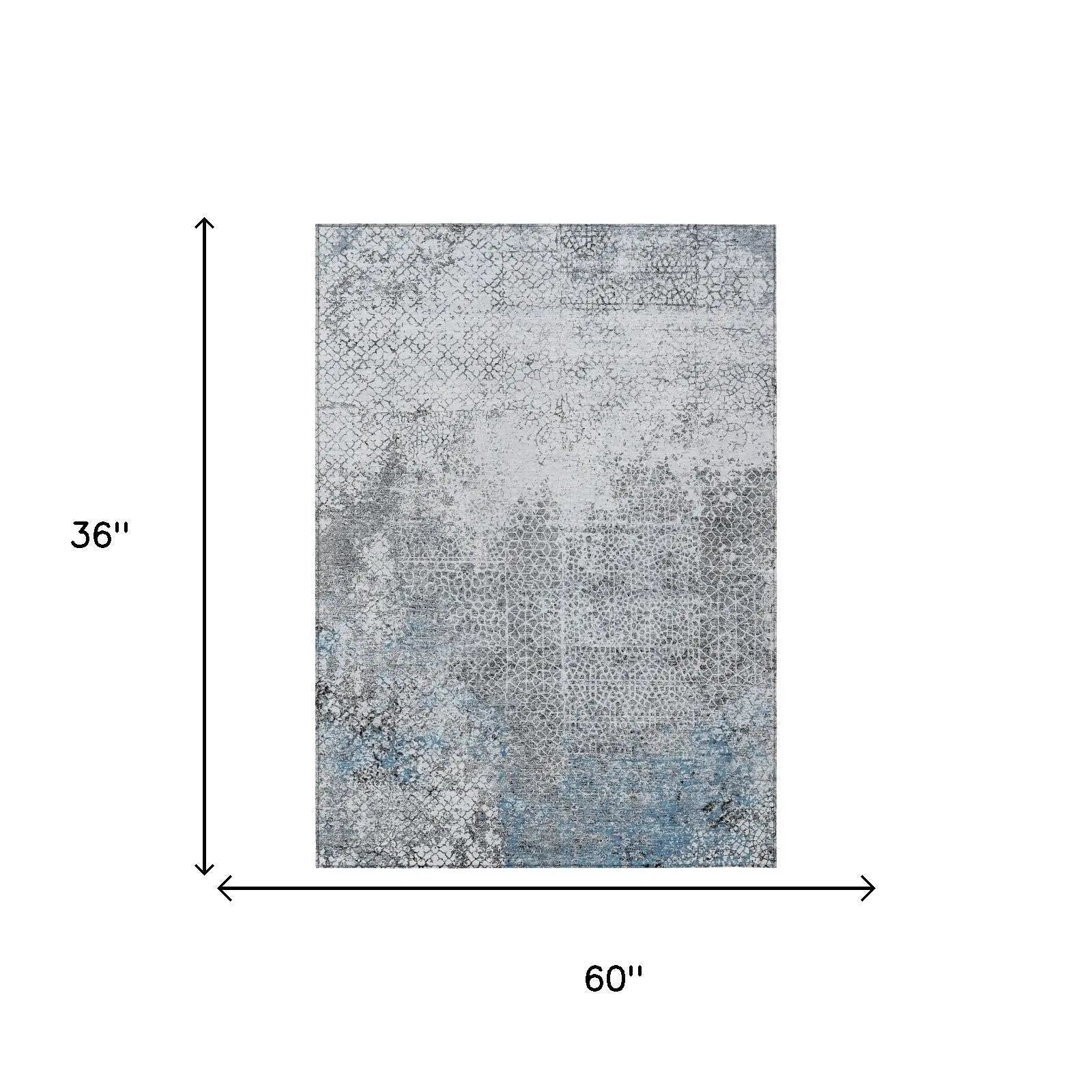 Gray and blue abstract patterned area rug, 36"x60", machine-made with a modern style.
