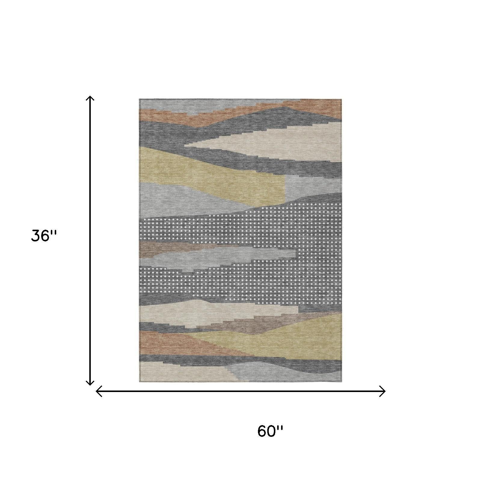 Modern geometric area rug, 60" x 36", in gray, beige, yellow, and rust colors, featuring a soft wool blend material.