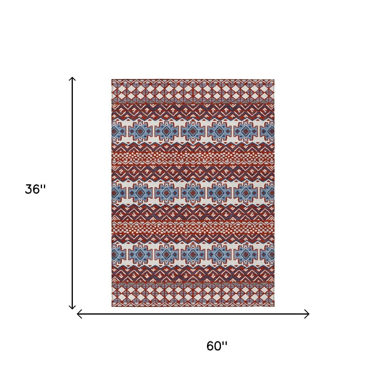 Red and blue patterned area rug, 36x60 inches, made of durable, soft fabric, perfect for vibrant home decor.