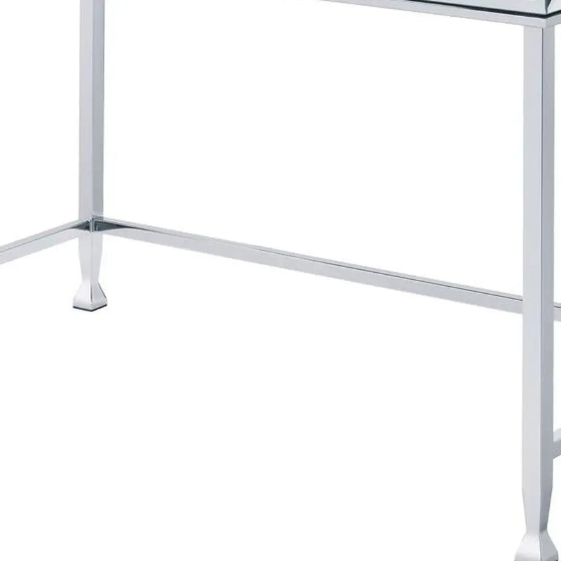 Modern chrome console table with a sleek glass top and elegant legs, perfect for contemporary decor.