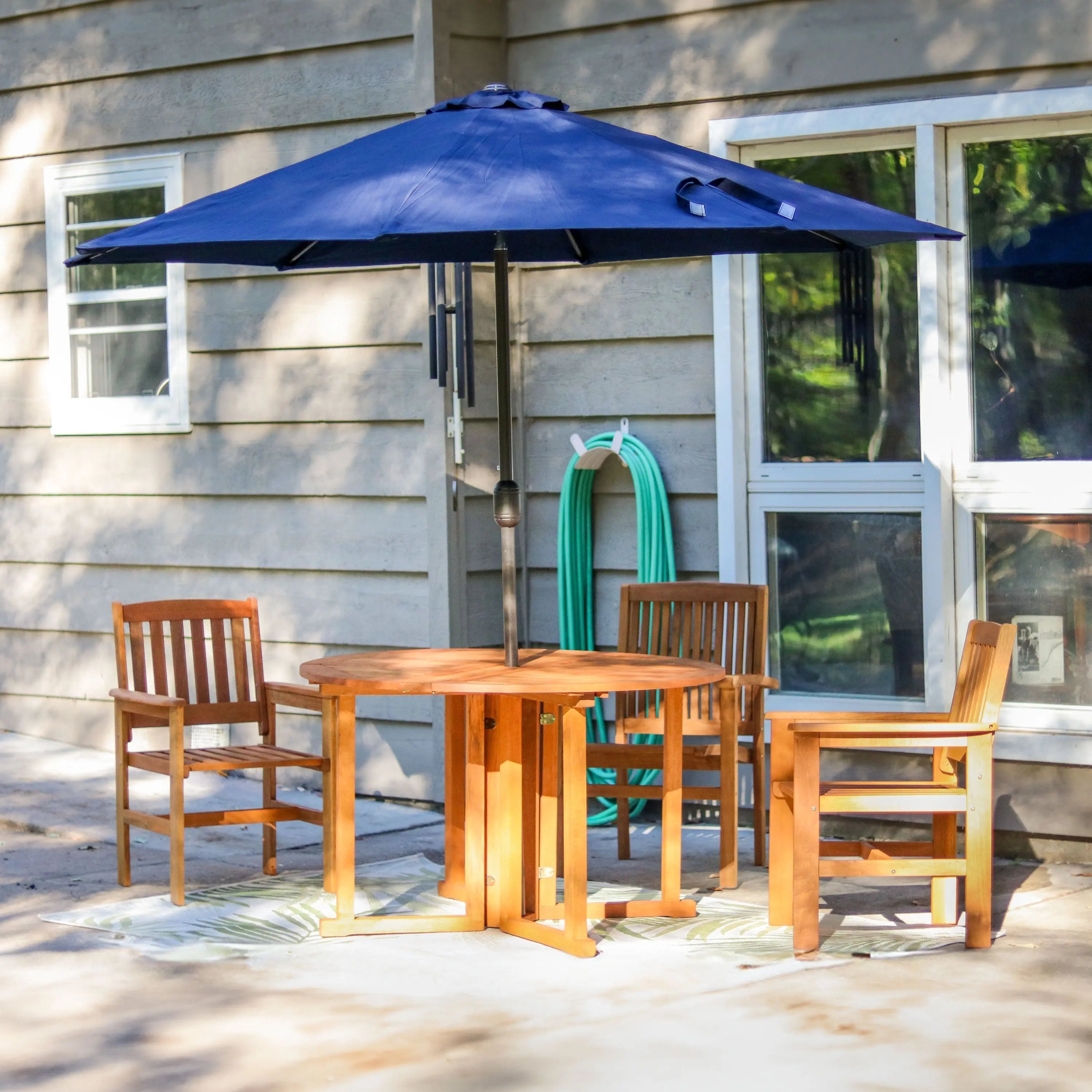 47" Brown Rounded Solid Wood Folding Outdoor Dining Table with Umbrella Hole Homeroots Outdoor