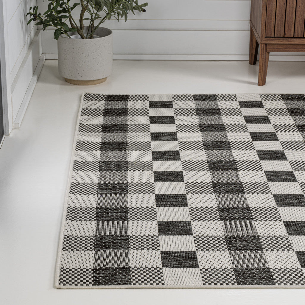 4' X 6' Black And Cream Geometric Indoor Outdoor Area Rug - GreatEagleInc