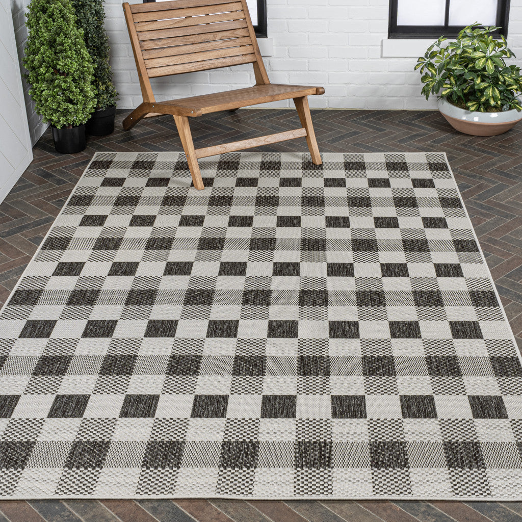 4' X 6' Black And Cream Geometric Indoor Outdoor Area Rug - GreatEagleInc