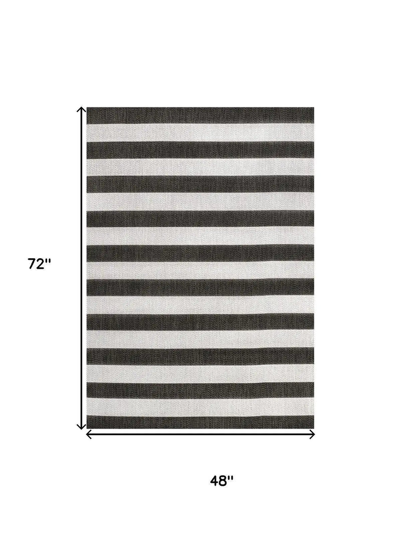 4' X 6' Black And Cream Striped Indoor Outdoor Area Rug Homeroots Outdoor