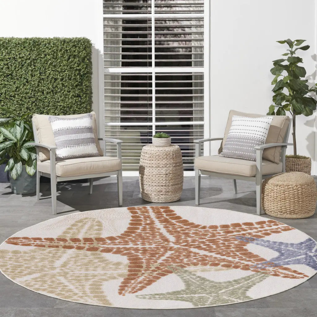 5' Ivory Yellow Orange And Green Round Starfish Indoor Outdoor Area Rug Homeroots Outdoor