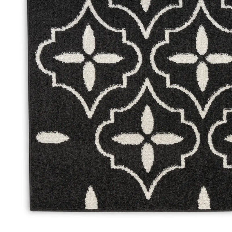 5' X 7' Black And Ivory Geometric Indoor Outdoor Area Rug Homeroots Outdoor