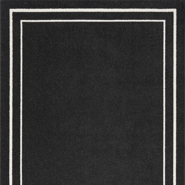 5' X 7' Black And Ivory Indoor Outdoor Area Rug Homeroots Outdoor
