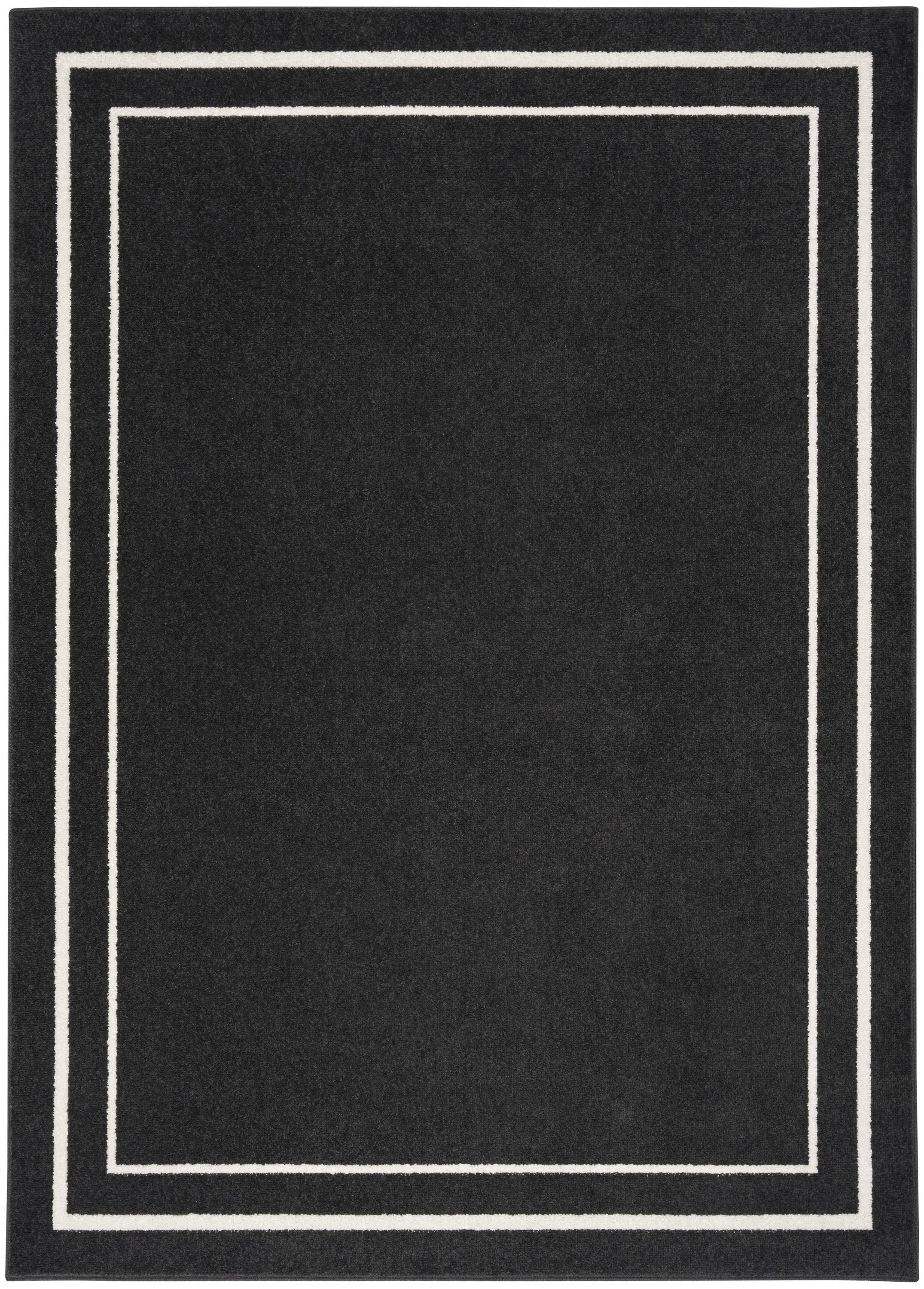 5' X 7' Black And Ivory Indoor Outdoor Area Rug Homeroots Outdoor