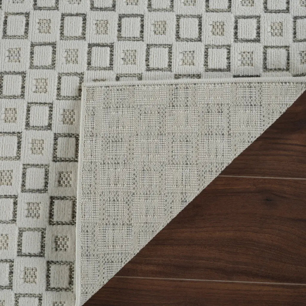 5' X 7' Cream and Beige Geometric Distressed Indoor Outdoor Area Rug Homeroots Outdoor