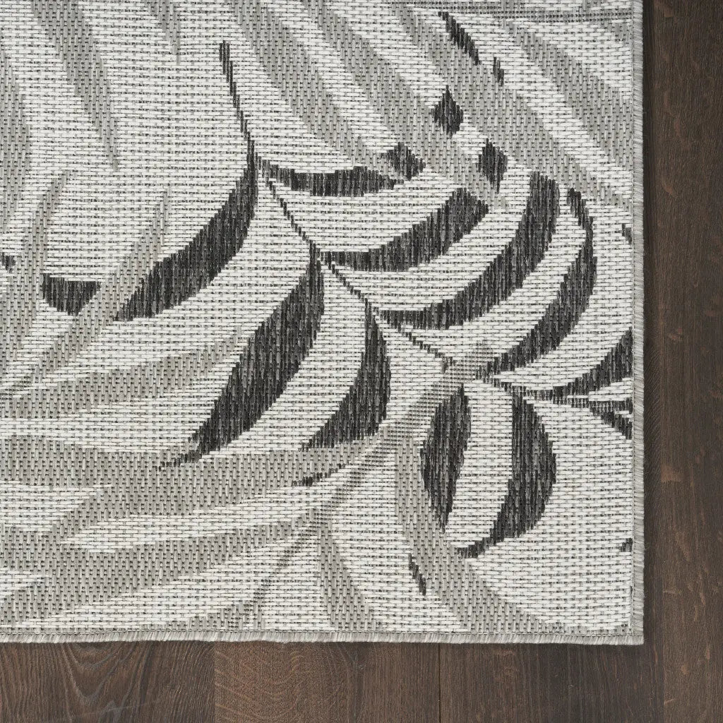 5' X 7' Gray Black And Ivory Palm Leaf Indoor Outdoor Area Rug Homeroots Outdoor