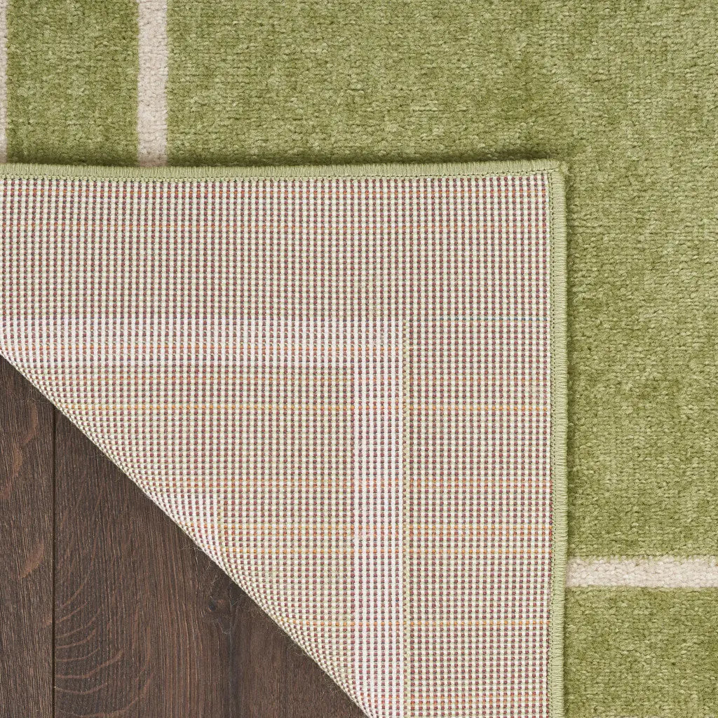 5' X 7' Green And Ivory Indoor Outdoor Area Rug Homeroots Outdoor