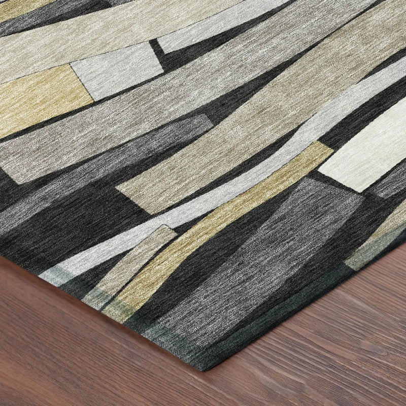 Modern geometric area rug in gray, beige, and gold tones, featuring a textured design, perfect for contemporary decor.