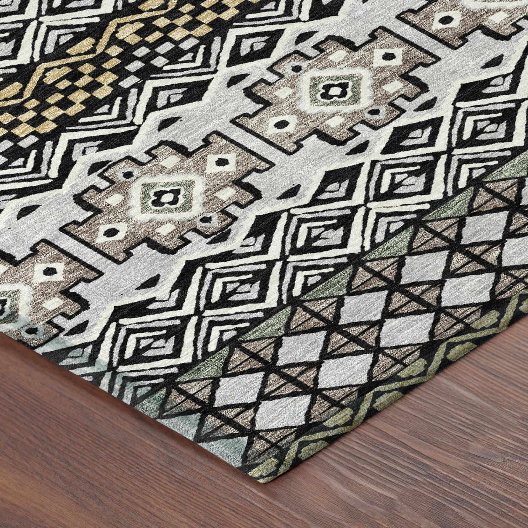 Multicolored geometric patterned area rug in cream, black, green, and gold; durable polyester material, contemporary style.