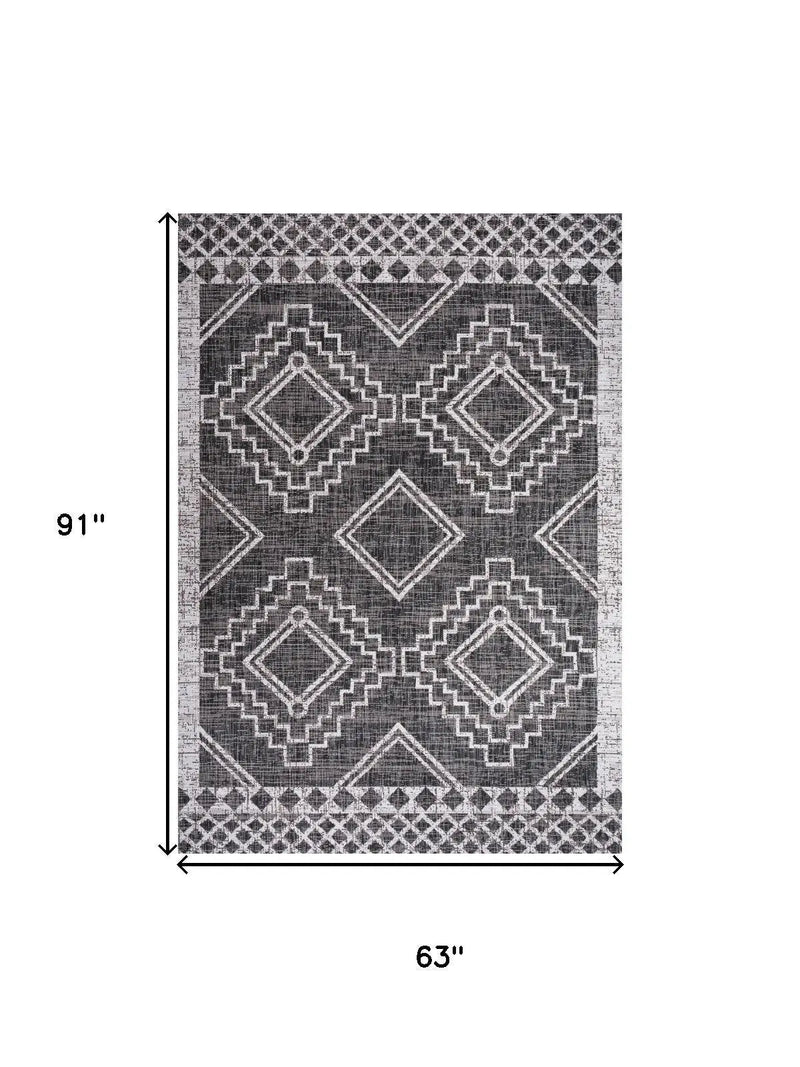 5' X 8' Black And Ivory Moroccan Indoor Outdoor Area Rug Homeroots Outdoor