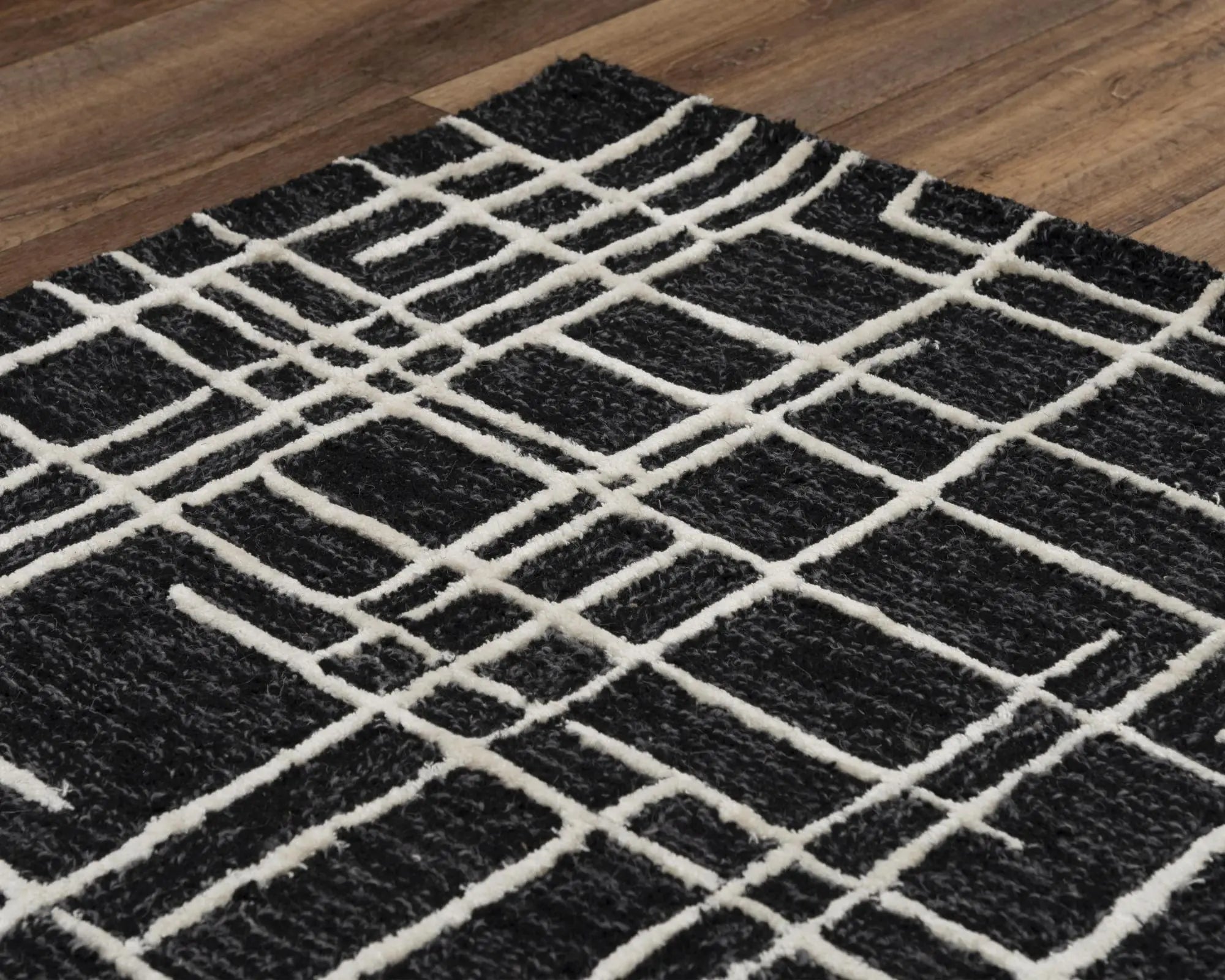 5' X 8' Black And Ivory Wool Geometric Hand Tufted Area Rug Homeroots Home Decor