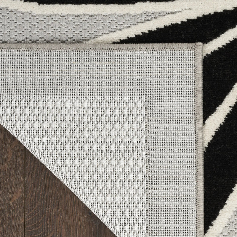 5' X 8' Black And White Floral Stain Resistant Non Skid Area Rug Homeroots Outdoor