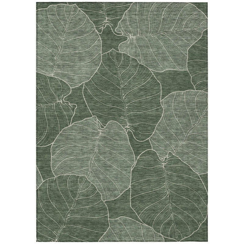Green leaf-patterned area rug made of durable, woven material, perfect for modern and nature-inspired decor.
