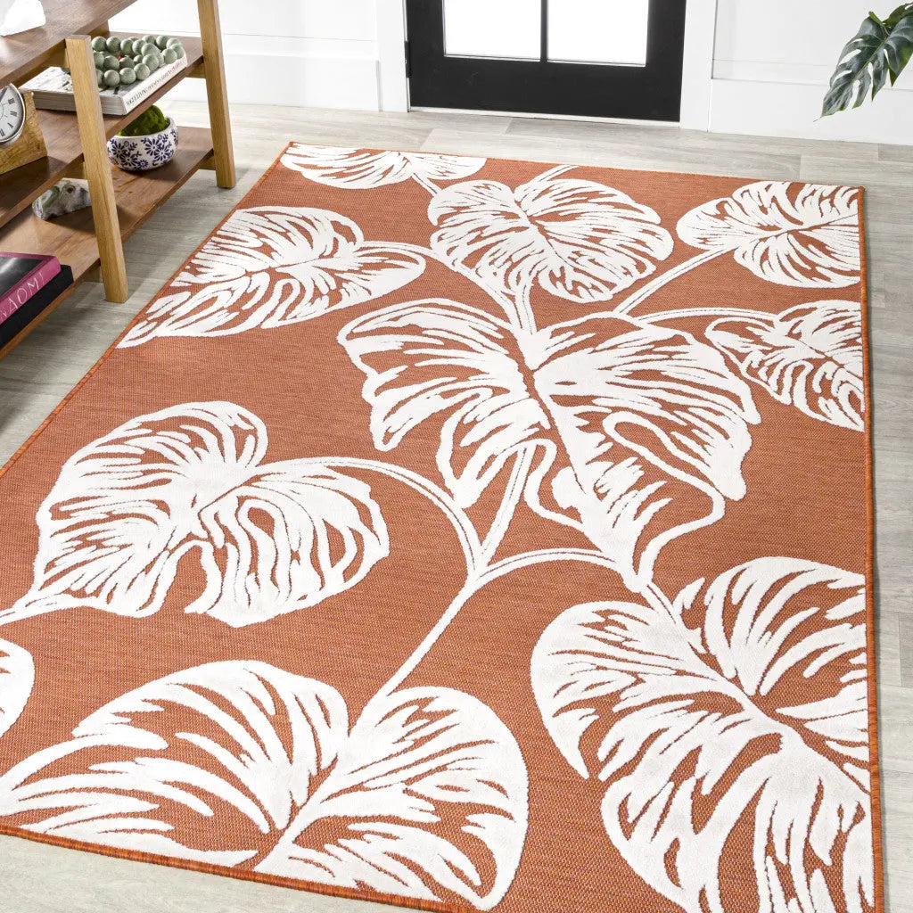 5' X 8' Orange And Ivory Floral Indoor Outdoor Area Rug - GreatEagleInc