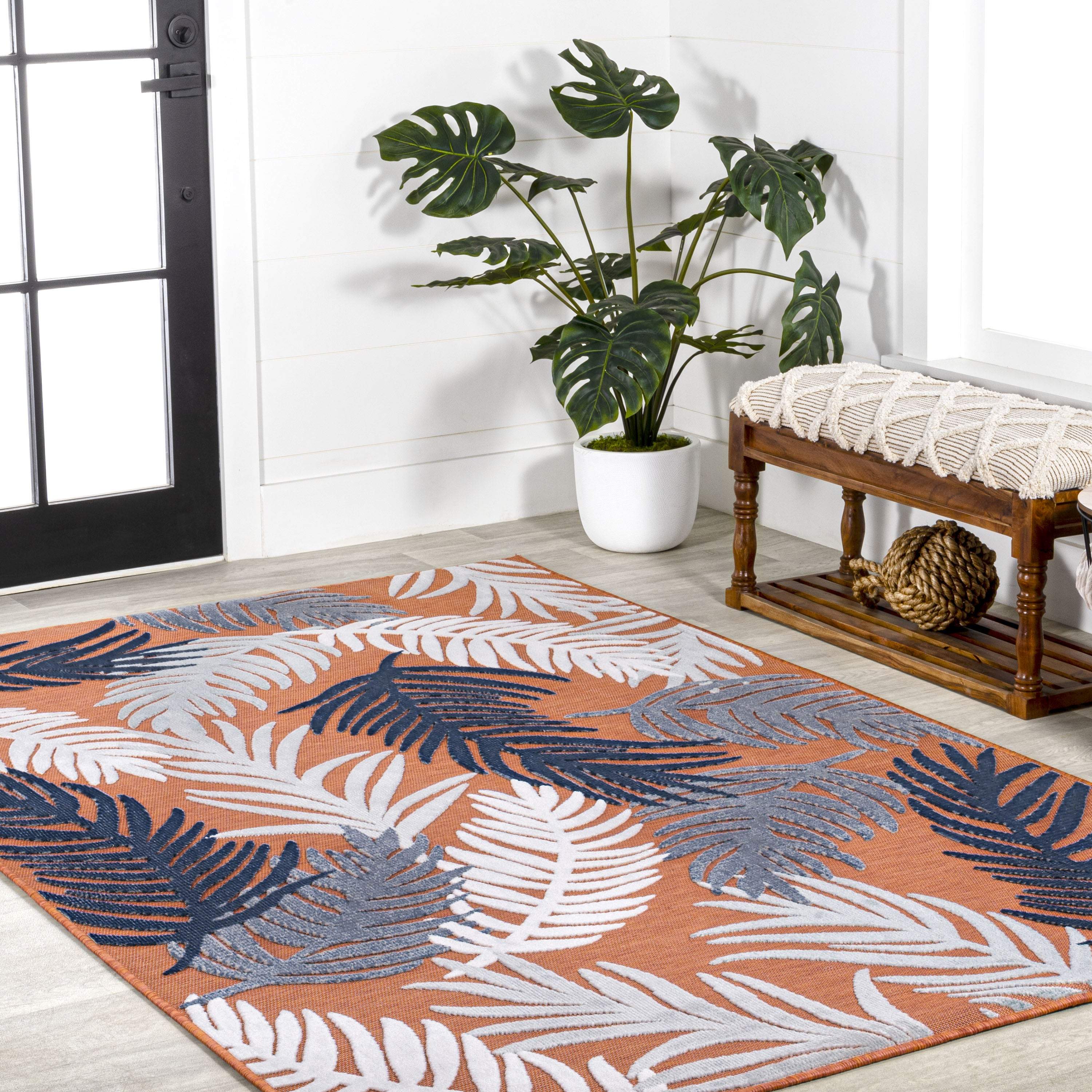 5' X 8' Orange Navy Blue And Ivory Floral Indoor Outdoor Area Rug - GreatEagleInc
