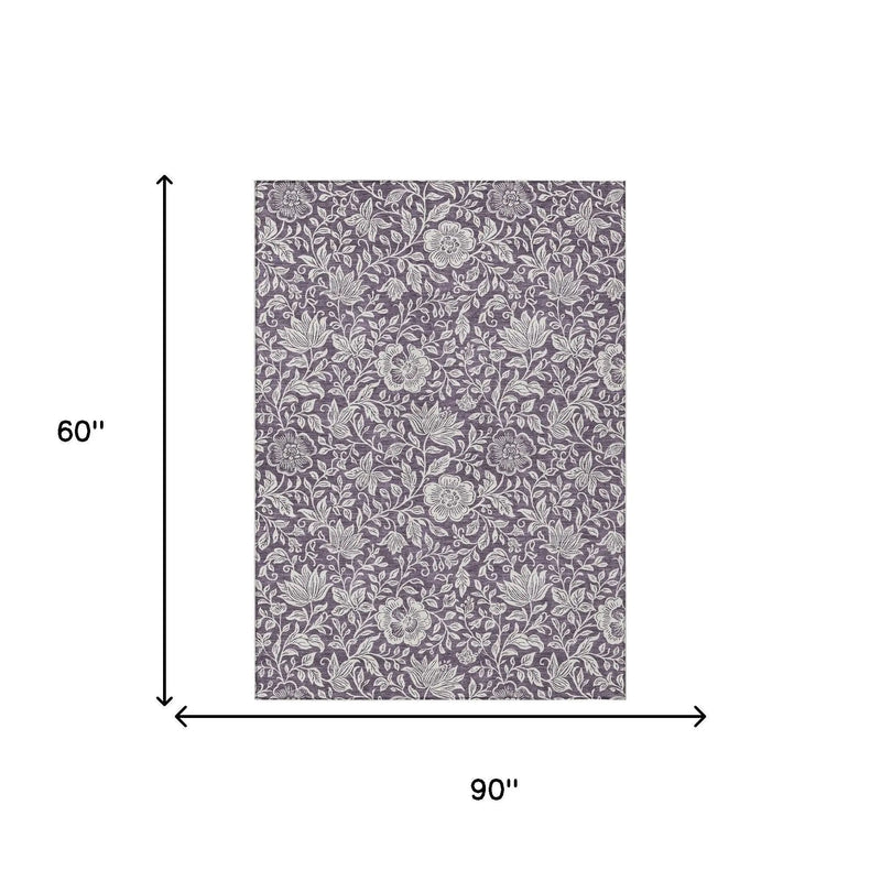 Purple floral patterned fabric, 90" x 60", durable cotton blend, perfect for home décor and upholstery projects.