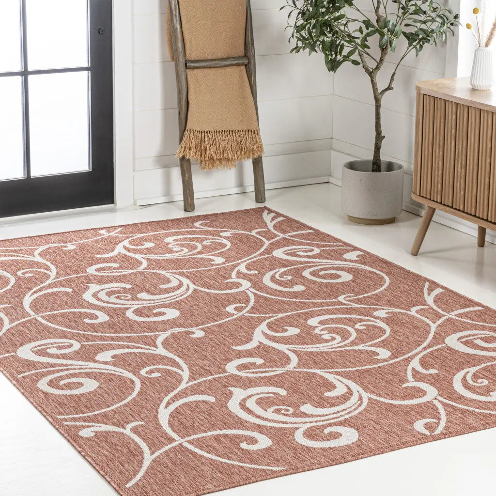 5' X 8' Salmon And Cream Floral Indoor Outdoor Area Rug - GreatEagleInc
