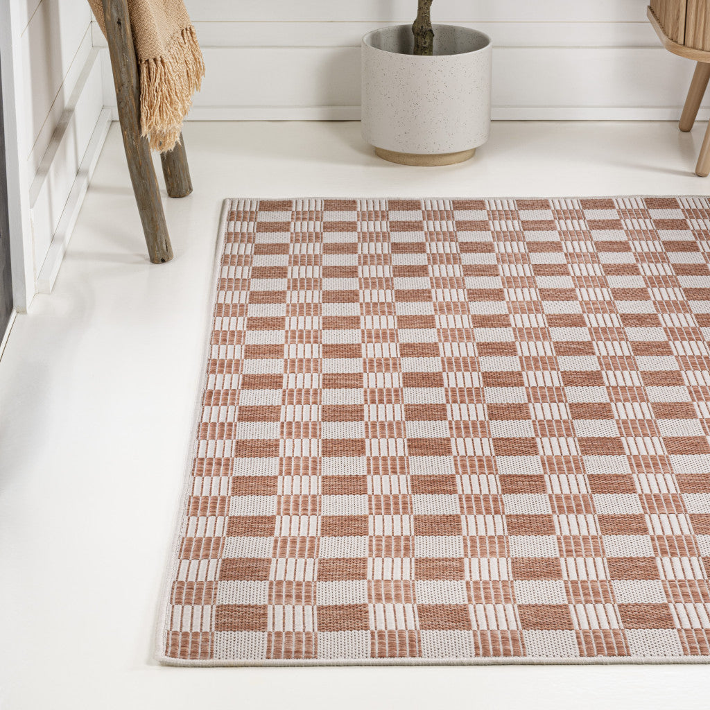 5' X 8' Salmon And Cream Geometric Indoor Outdoor Area Rug - GreatEagleInc