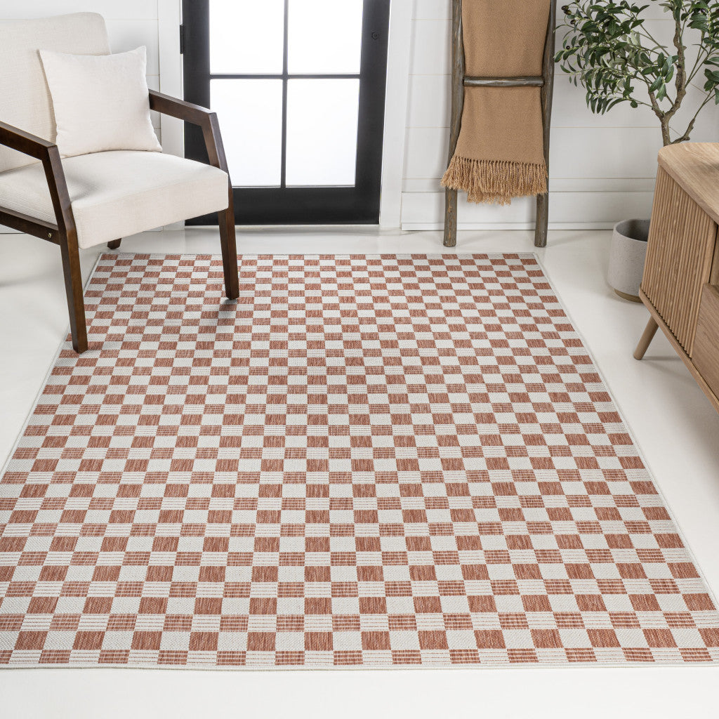 5' X 8' Salmon And Cream Geometric Indoor Outdoor Area Rug - GreatEagleInc