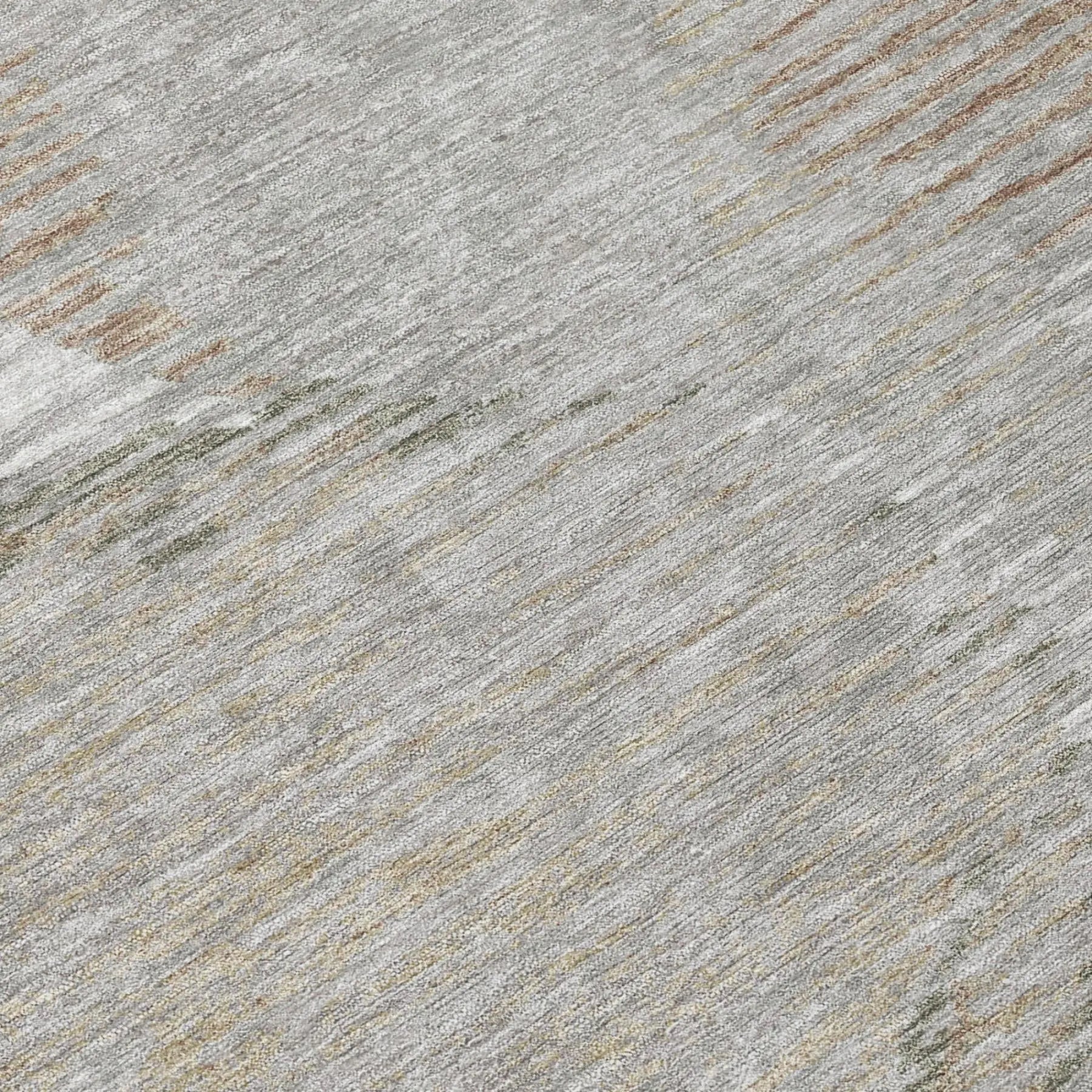 Abstract grey area rug with hints of gold, green, and beige in soft, durable fabric for modern interiors.