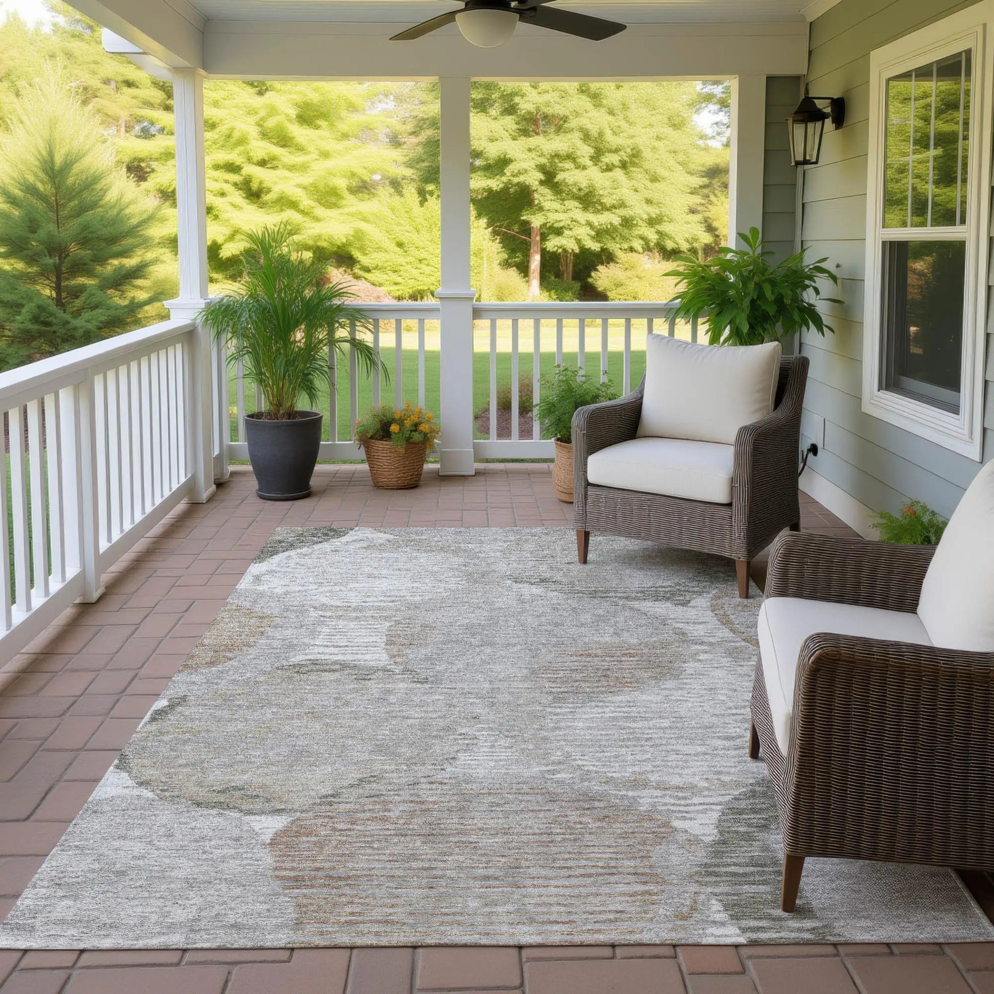 Cream and gray abstract indoor/outdoor area rug, perfect for porches, with soft texture and modern style.