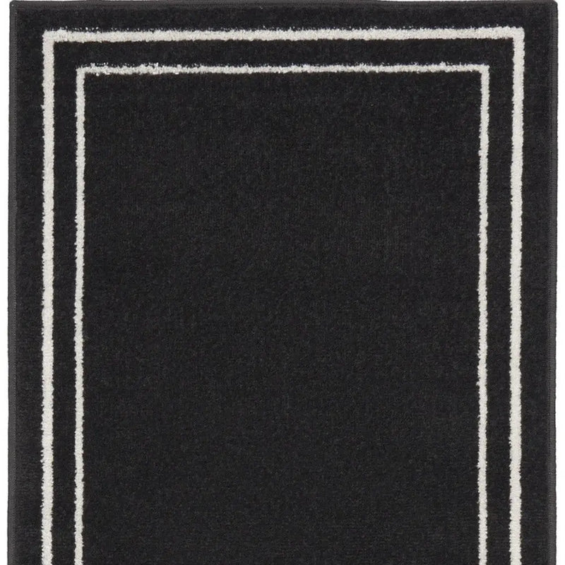 6' Black And Ivory Indoor Outdoor Runner Rug Homeroots Outdoor