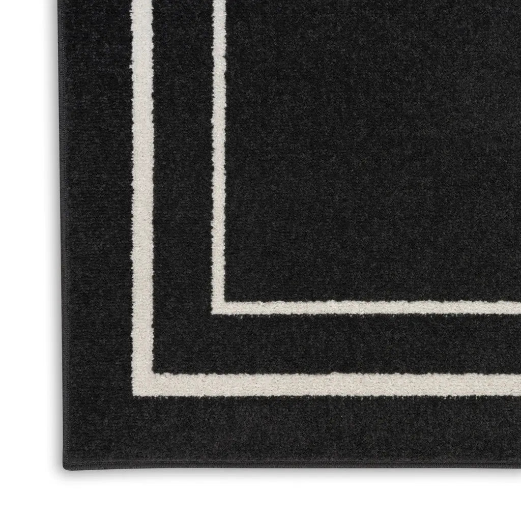 6' Black And Ivory Indoor Outdoor Runner Rug Homeroots Outdoor