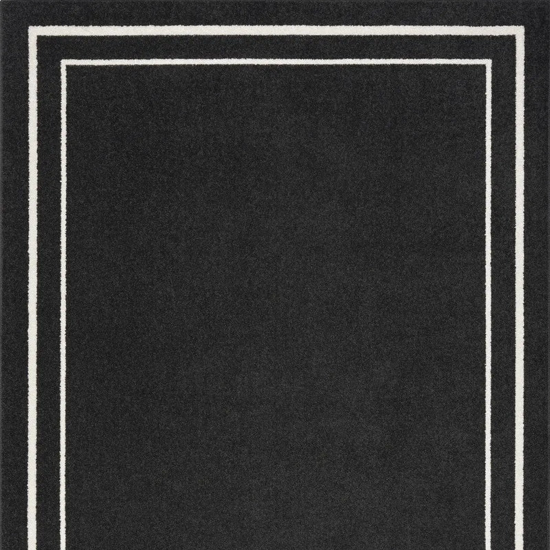 6' X 9' Black And Ivory Indoor Outdoor Area Rug Homeroots Outdoor
